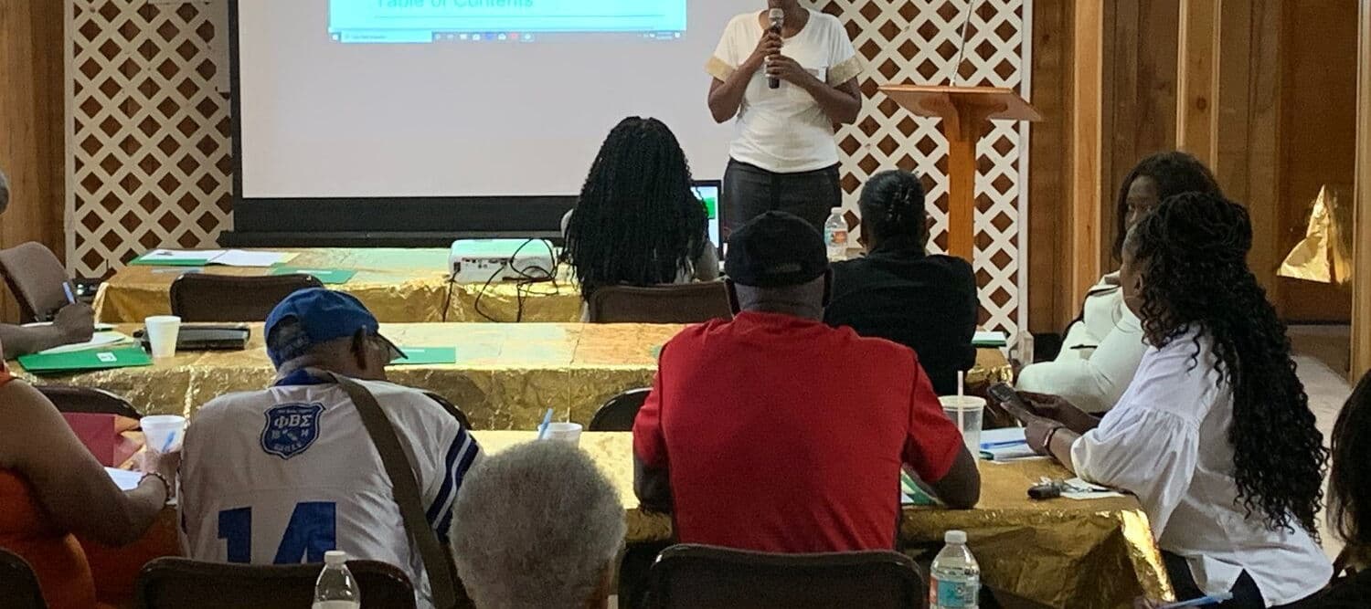 Residents reviewing maps and materials at a North Port St. Joe master plan session