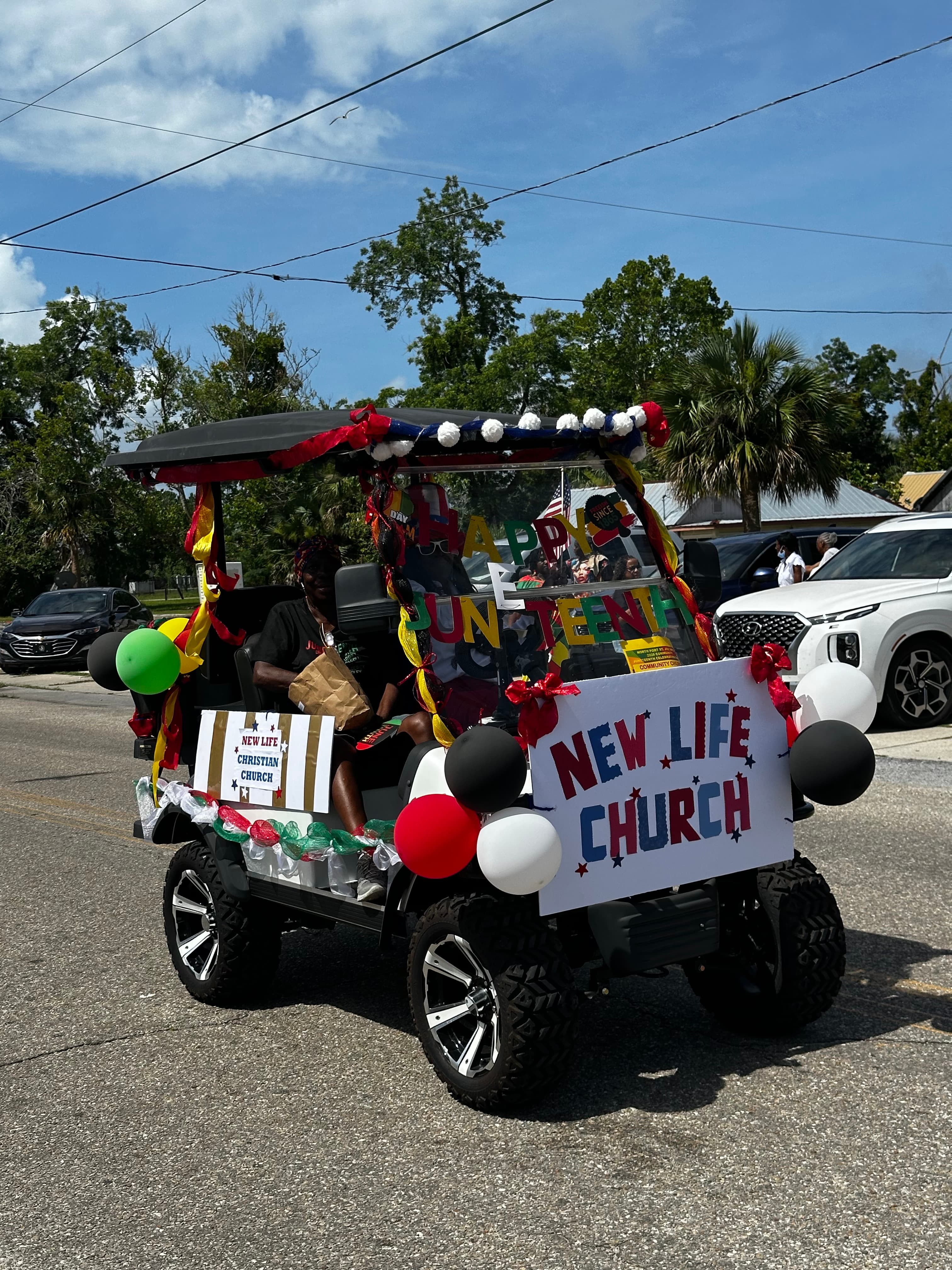 New Life Church parade float decorated in Juneteenth colors during the parade